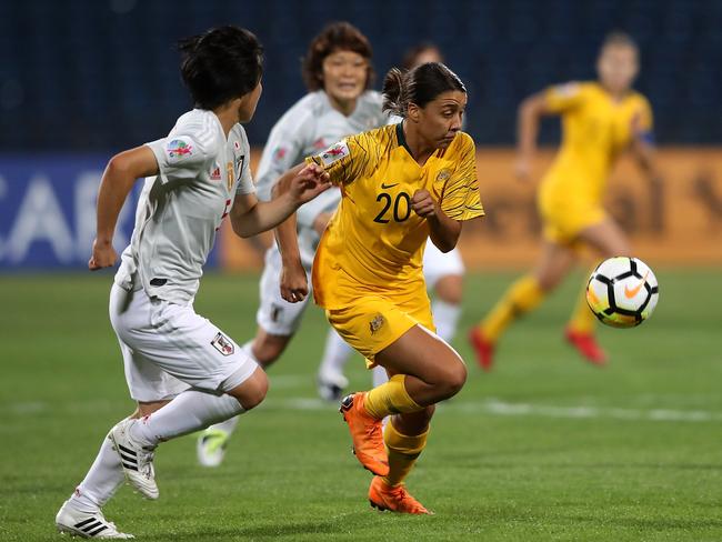 Samantha May Kerr of Australia and Nana Ichise of Japan in action during the AFC Women's Asian Cup final.