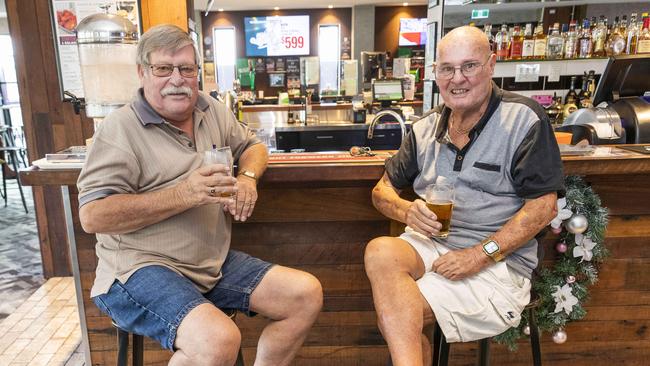 Ken Bischof and Roy Stirling enjoy a beer at the Raceview Hotel in Ipswich. Picture: Glenn Hunt