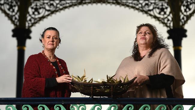 Tina Quitadamo and Rachel Abdulla represent a coalition of services who every year hold a vigil in Elder park on May 6 for women who have died due to domestic and family violence. Picture: Naomi Jellicoe