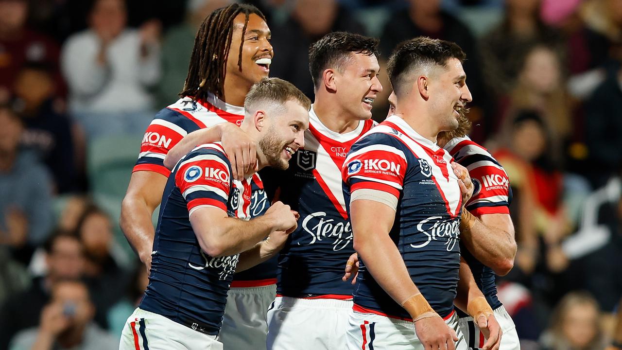 PERTH, AUSTRALIA - AUGUST 02: Sam Walker of the Roosters celebrates his try with his team mates during the round 22 NRL match between Dolphins and Sydney Roosters at HBF Park, on August 02, 2024, in Perth, Australia. (Photo by James Worsfold/Getty Images)