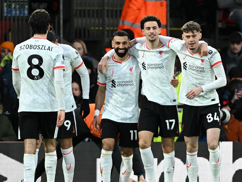 Mohamed Salah celebrates lifting Liverpool nine points clear in the title race. Picture: Getty