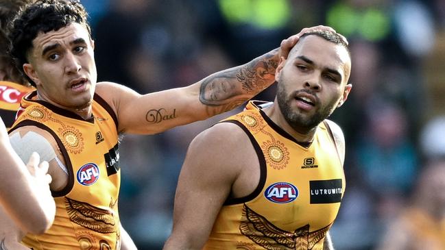 Jarman Impey, pictured celebrating a goal in the jumper he helped design, has kicked a booming major in each of the past two weeks.