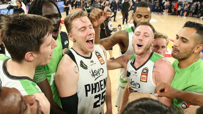 South East Melbourne Phoenix players, including Mitch Creek (second from right) celebrate their big win. Picture: Michael Klein.