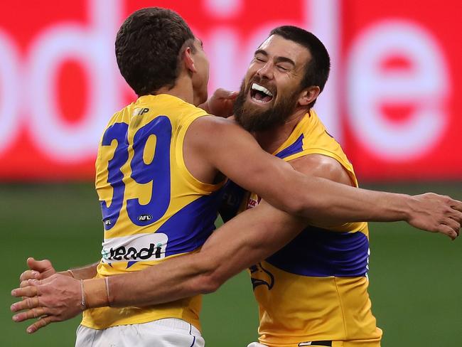 PERTH, AUSTRALIA - JULY 19: Jarrod Cameron and Josh J. Kennedy of the Eagles celebrate a goal during the round 7 AFL match between the Fremantle Dockers and the West Coast Eagles at Optus Stadium on July 19, 2020 in Perth, Australia. (Photo by Paul Kane/Getty Images)