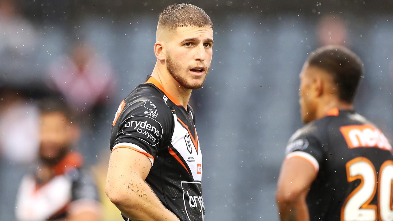 SYDNEY, AUSTRALIA - MARCH 21: Adam Doueihi of the Wests Tigers looks dejected during the round two NRL match between the Wests Tigers and the Sydney Roosters at Campbelltown Sports Stadium, on March 21, 2021, in Sydney, Australia. (Photo by Mark Kolbe/Getty Images)