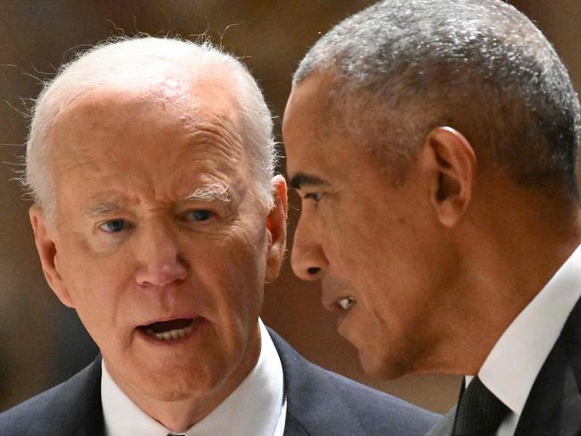 TOPSHOT - US President Joe Biden (L) speaks with former US President Barack Obama during the memorial service for Ethel Kennedy, the wife of the late senator Robert F. Kennedy, at the Cathedral of St. Matthew the Apostle in Washington, DC on October 16, 2024. (Photo by Mandel NGAN / AFP)