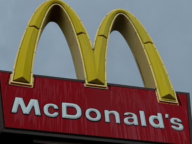 MIAMI, FLORIDA - JULY 26: A McDonalds sign hangs outside the fast food restaurant on July 26, 2022 in Miami, Florida. The McDonald's company reported U.S. same-store sales rose 3.7%, while international sales rose 9.7% during the most recent quarter. However, it also said that total revenue fell 3% to $5.72 billion; it attributed the weakness to slowing demand in China.   Joe Raedle/Getty Images/AFP == FOR NEWSPAPERS, INTERNET, TELCOS & TELEVISION USE ONLY ==