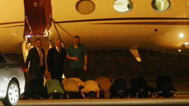 Palestinian prisoners, released as part of a deal that freed Israeli soldier Gilad Shalit, kneel down upon arrival at the Esenboga airport in Ankara, Turkey in 2011. Picture: AFP
