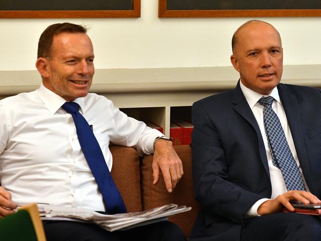 Tony Abbott and Peter Dutton at a Coalition party room meeting at Parliament House in Canberra last week. (AAP Image/Mick Tsikas)