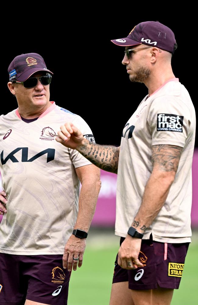 Darius Boyd (R) with Kevin Walters at broncos training. Picture: Bradley Kanaris/Getty Images