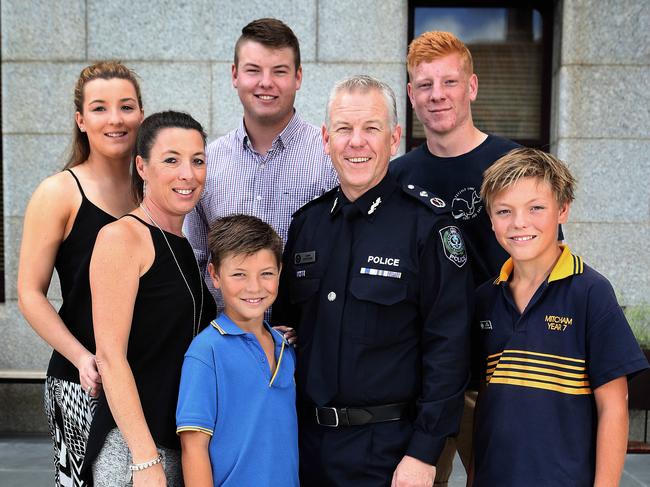 18/03/15 - At Parliament House, Grants Stevens confirmation as the new Police Commissioner. Pictured here with his family including, (clockwise from front left)  Charlie,9, his wife Emma, Sophie,19, Dylan,20, Josh,18, and Tom,12. Picture Dean Martin