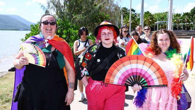 Liz Walton, Gotham Stevens and Holly-Rose Powell marched along the Cairns Esplanade for the Pride Stride on Saturday, part of the 2024 Cairns Pride Festival. Picture: Brendan Radke