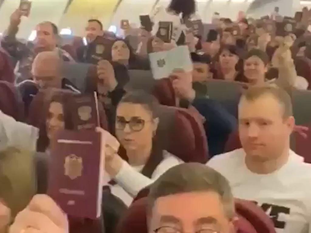 Vision shared by a Ukrainian newspaper purports to show Moldovan expats being flown home on a chartered flight to cast a vote in the country's crucial election.