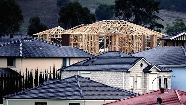 SYDNEY, AUSTRALIA - AUGUST 02:  A house stands under construction amongst an established suburb August 2, 2006 in Sydney, Australia. The Reserve Bank of Australia today raised the official interest rate for the second time this year to 6 per cent. The quarter of a per cent rise is the seventh increase since early 2002, and takes the official interest rate to its highest level in five-and-a-half-years. Around three million households will be affected by the rise, as well as an already faltering building sector. The rise has been attributed to a move to rein in consumer spending to head off rising inflation, which has in turn been fed by the rising fuel costs.  (Photo by Ian Waldie/Getty Images)