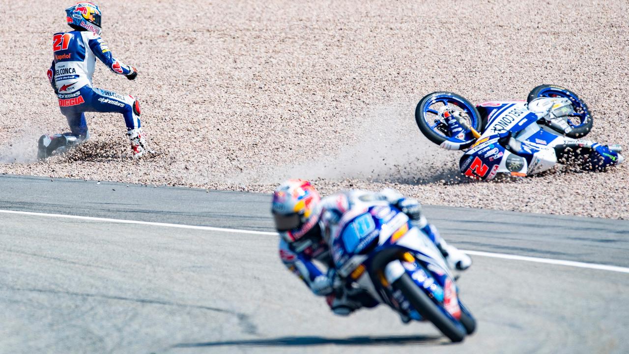 Di Giannantonio tumbled into the gravel while teammate Martin continued on to victory.