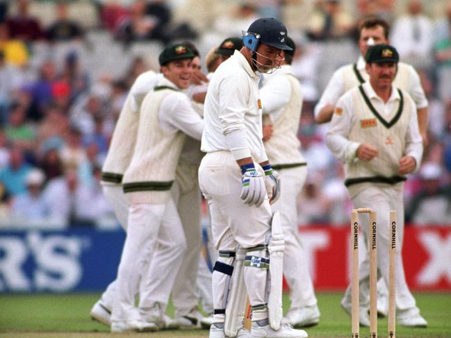 Mike Gatting looks back at his stumps in shock after being bowled by Shane Warne. Picture: PA Images via Getty Images