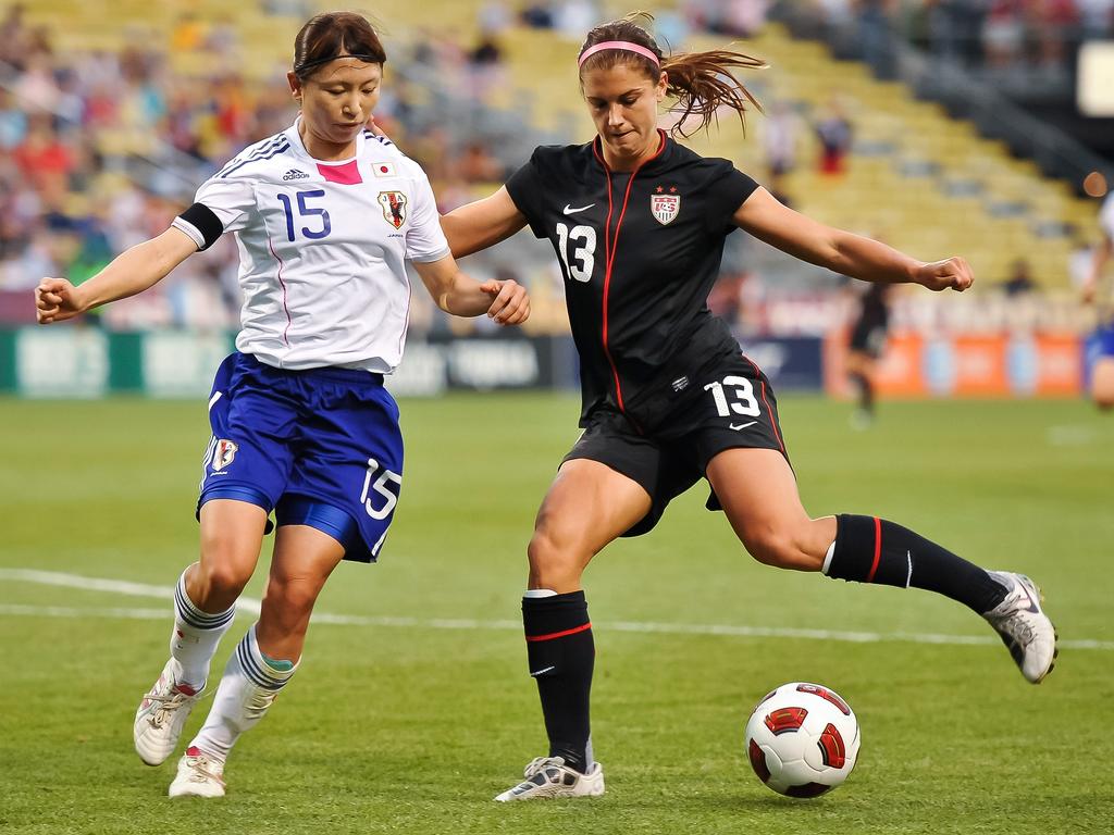 Morgan (R) playing for the US in 2011. Picture: Jamie Sabau/Getty Images