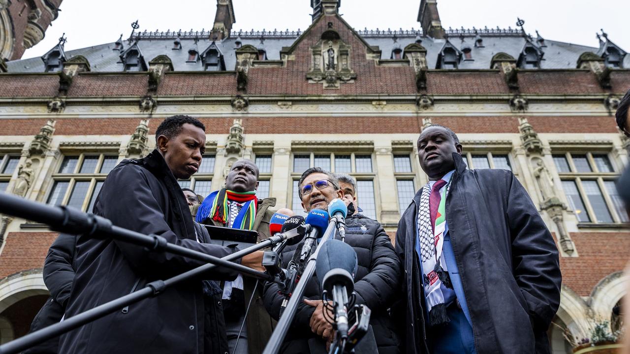 The South African delegation speaks to the press before the International Court of Justice (ICJ). Picture: Remko de Waal