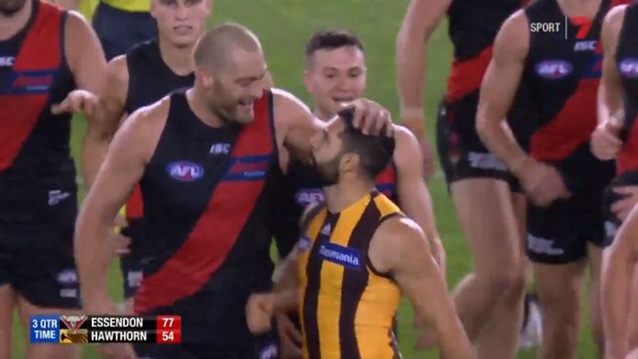Tom Bellchambers laughs after being confronted by Paul Puopolo at three-quarter-time.