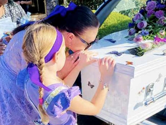 Jessica Geddes mother and daughter say their final farewell at the young mother’s funeral. Picture: supplied