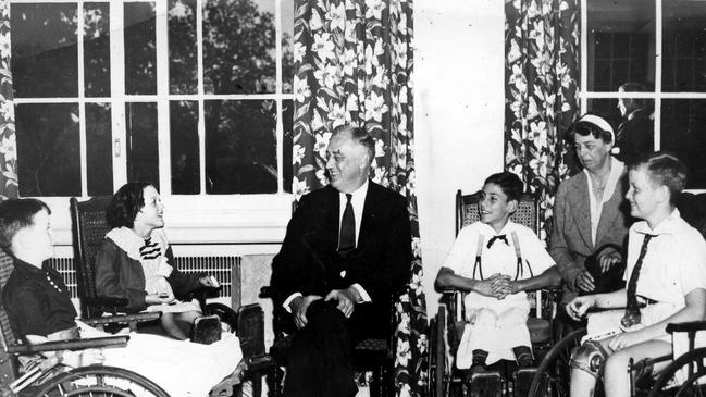 Former US President Franklin Roosevelt met with polio victims at the Warm Springs Foundation for Infantile Paralysis in Georgia, US, in 1945. Picture: News Corp