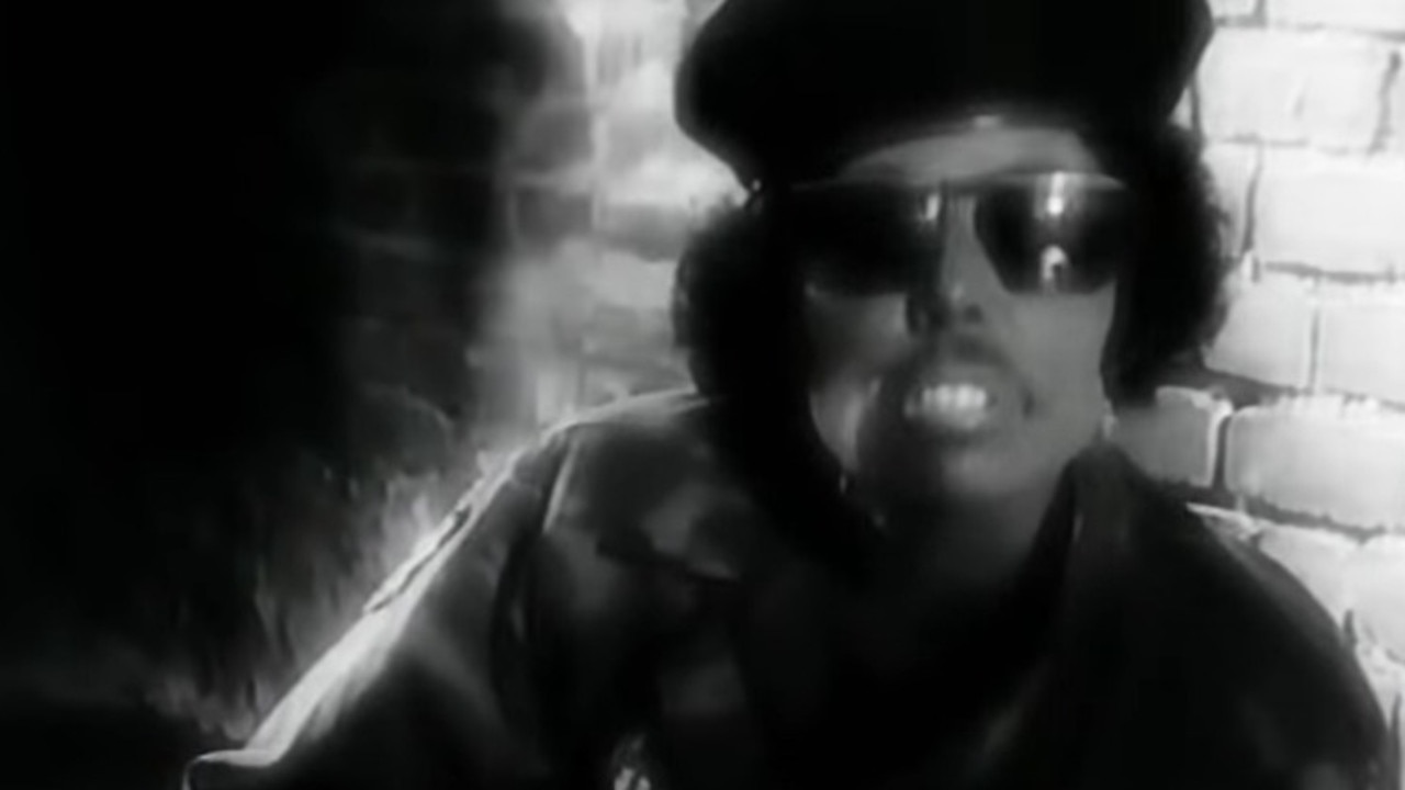 Joni in 1988, portraying a Black soldier in a music video.