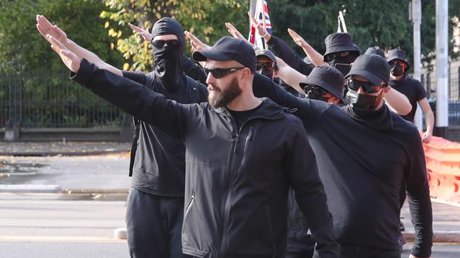 Far right activist Thomas Sewell is seen giving a Nazi salute in Melbourne in May. Picture: NCA NewsWire / David Crosling