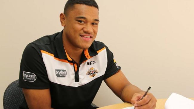 Moses Suli, 18, has signed a reported record $1.3 million contract (for a rookie) with the Wests Tigers NRL team ahead of the 2017 season.
