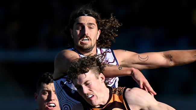 LAUNCESTON, AUSTRALIA - JULY 13: Luke Jackson of the Dockers and Denver Grainger-Barras of the Hawks compete for the ball during the round 18 AFL match between Hawthorn Hawks and Fremantle Dockers at University of Tasmania Stadium, on July 13, 2024, in Launceston, Australia. (Photo by Steve Bell/Getty Images)