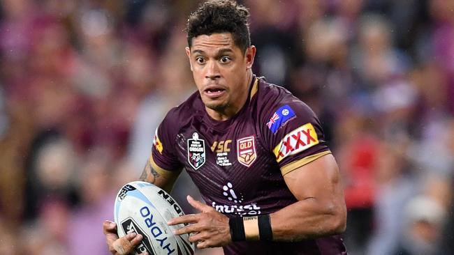 Dane Gagai runs the ball for the Maroons.