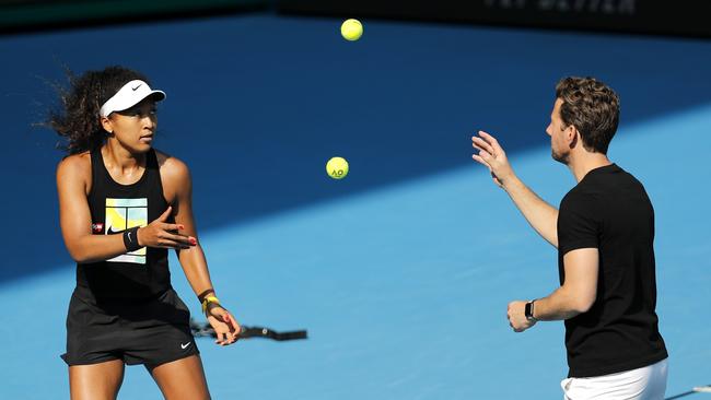 Japan’s Naomi Osaka warms up with her coach Wim Fissette last week. Picture: AP