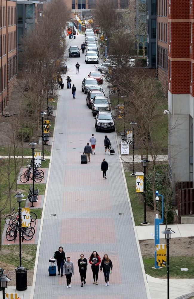 Towson University students remove their belongings out of the dorms as the school shut down days before the start of the scheduled spring break. Picture: Getty