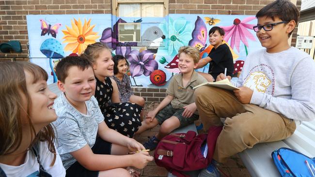 Alex Jacquot, right, and his fellow airline executives meet at school in Sydney. Picture: John Feder