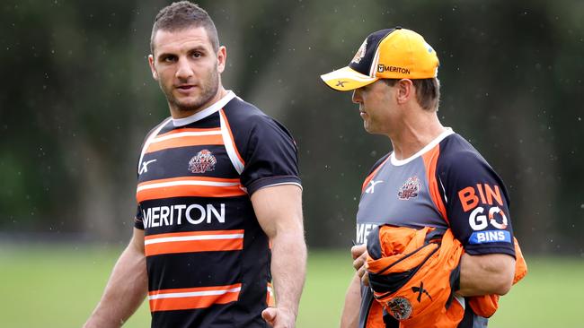 Tiger's Robbie Farah and coach Mick Potter.