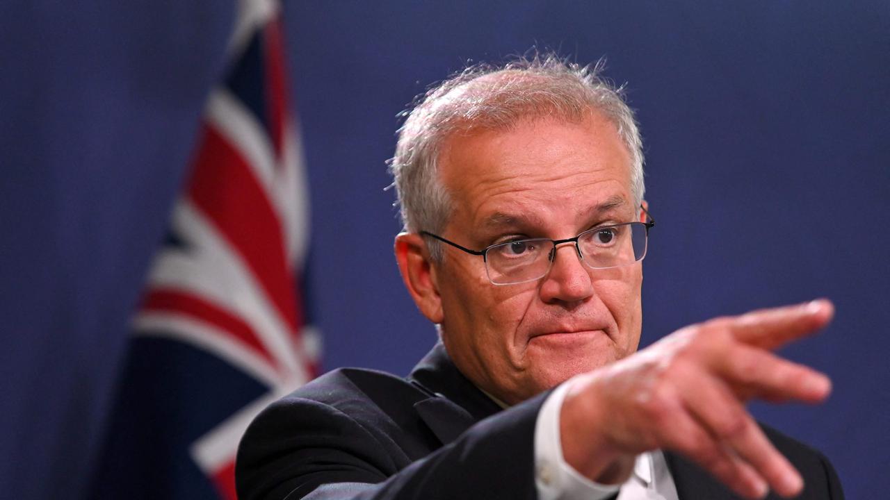 Scott Morrison said Russia was behaving like a “thug and a bully”, and said a full-scale invasion of Ukraine was likely to occur within the next 24 hours. (Photo by Steven SAPHORE / AFP)