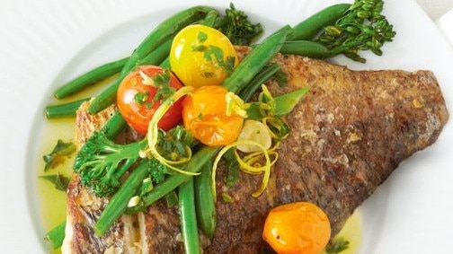 Crispy skin barra with garlic and herb oil. Picture: taste.com.au