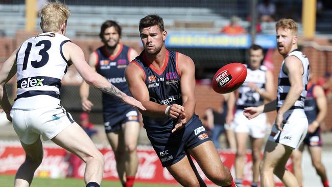 Mitch Grigg fires off a handpass against South Adelaide this year. Picture Sarah Reed