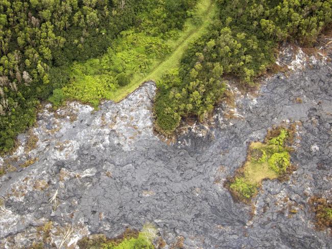 The lava flow is threatening homes in Hawaii in what has been described as a disaster in slow motion. Picture: US Geological Survey / AP