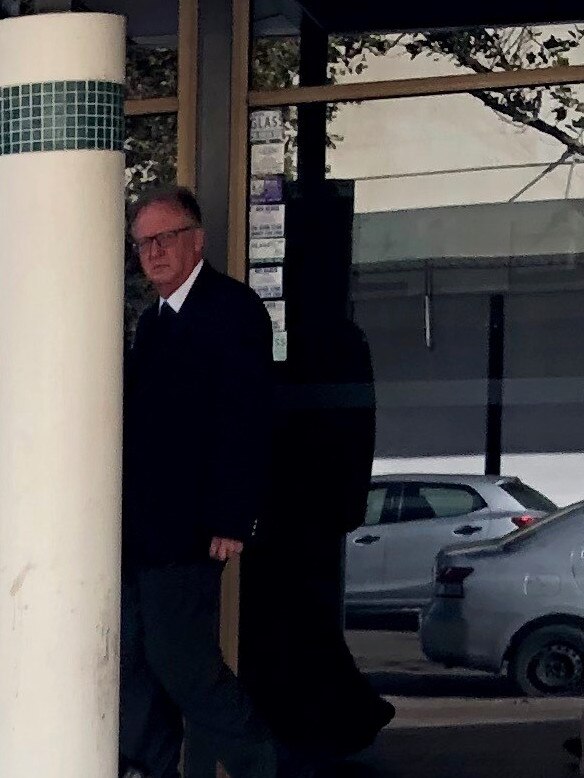 Ronald Peters - a Catholic priest known commonly as 'Father Ron' - leaves Fairfield Local Court on May 15, 2019.