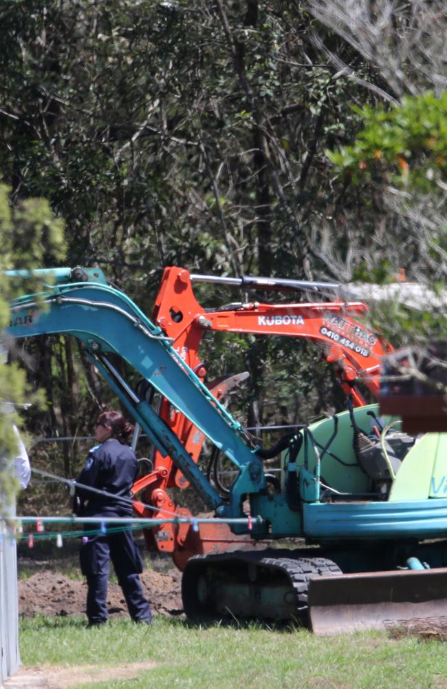 An excavator digs for traces on the Thorburn’s property for Tiahleigh’s school uniform. Picture: Jack Tran