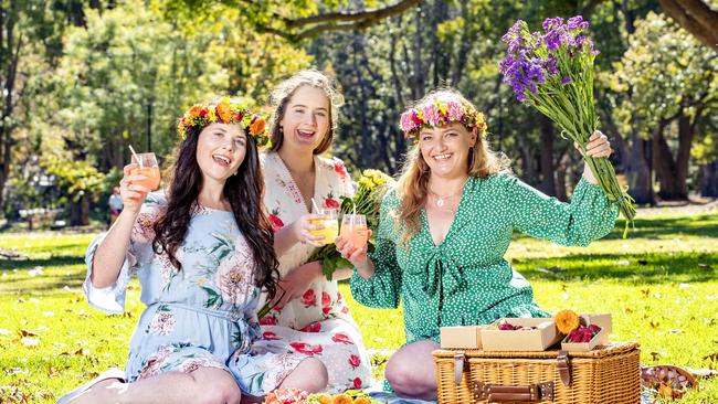 Kate Rosier, Eileen Scott and Jenna Buckley are ready for the 2021 Toowoomba Carnival of Flowers. Picture: Richard Walker