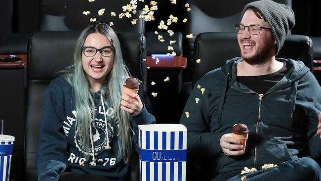 Friends Ruby Southwell and Michael Howling enjoy their favoUrite movie at GU Film House, Adelaide.Picture: Dylan Coker