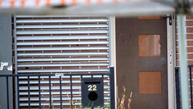 The front door of a home which was shot at by a gunman overnight. Picture: Jay Town