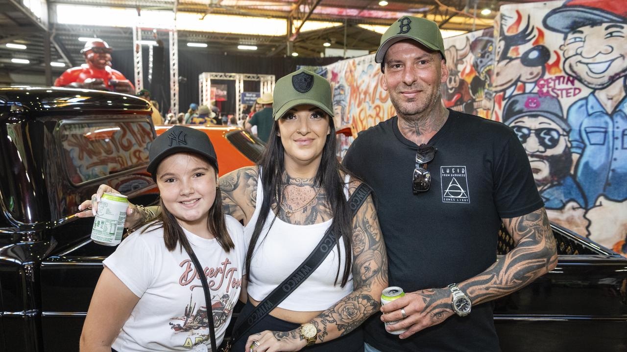 Ellah-Shaye with mum Kez Cole and Nathan Collins at Meatstock at Toowoomba Showgrounds, Friday, April 8, 2022. Picture: Kevin Farmer