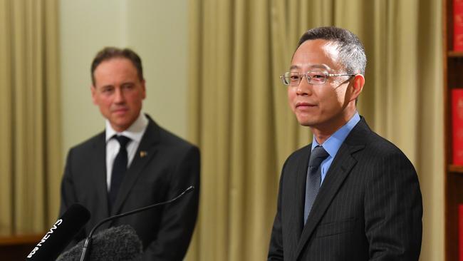 Victoria and Tasmania Consul-General of China Long Zhou (right) and Health Minister Greg Hunt during a press conference at the Commonwealth Parliamentary Offices in Melbourne, in April, 2020.