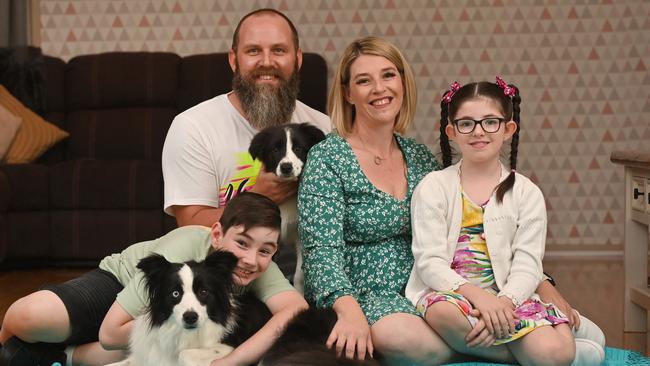 Connor Richardson, 10, with 4-year-old border collie Sura, Jase Hill holding 13-week-old puppy Fenn, Lorraine Richardson and Maddi Richardson, 8. Picture: Keryn Stevens