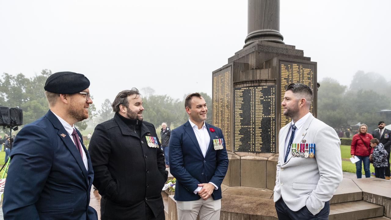 Army mates (from left) Mick Harro, Skipp Sealy, Mathew Vglik and Beau McNamara gather at the Mothers' Memorial after the Anzac Day dawn service, Monday, April 25, 2022. Picture: Kevin Farmer