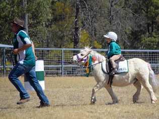 BARRELS OF FUN: Alison Stait competing in the barrel races with her pony Salty at the Miles Horse and Pony Club Gymkhana. Picture: Kate McCormack