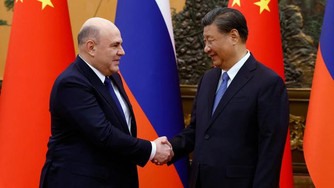 Russian Prime Minister Mikhail Mishustin and Chinese President Xi Jinping in Beijing. Picture: AFP.