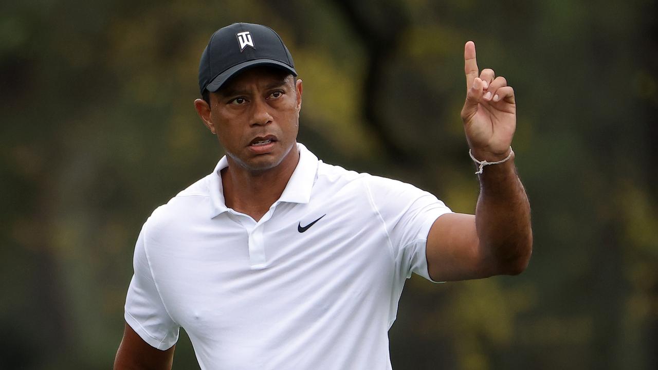 Tiger Woods gestures during a practice round prior to the Masters at Augusta.